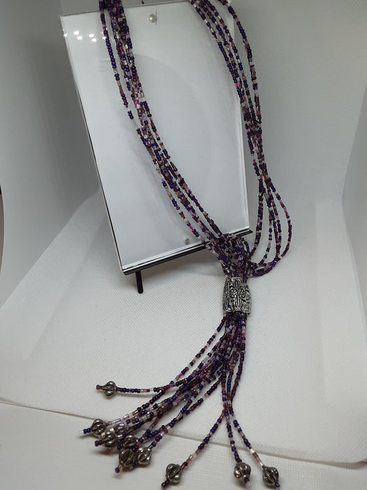 Handmade purple and silvertone beaded necklace