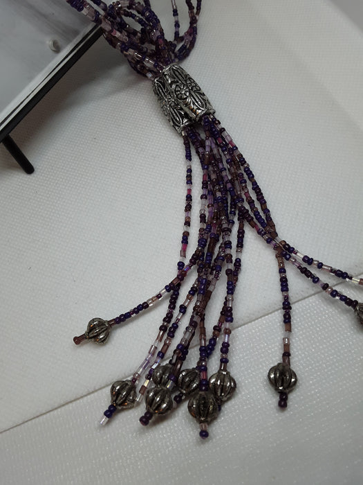 Handmade purple and silvertone beaded necklace